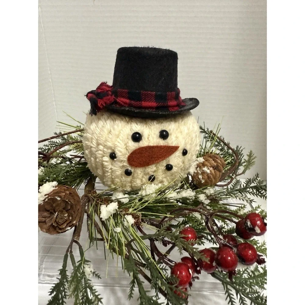 Adorable snowman head centerpiece in a wreath. Top Hat pinecones, Berries